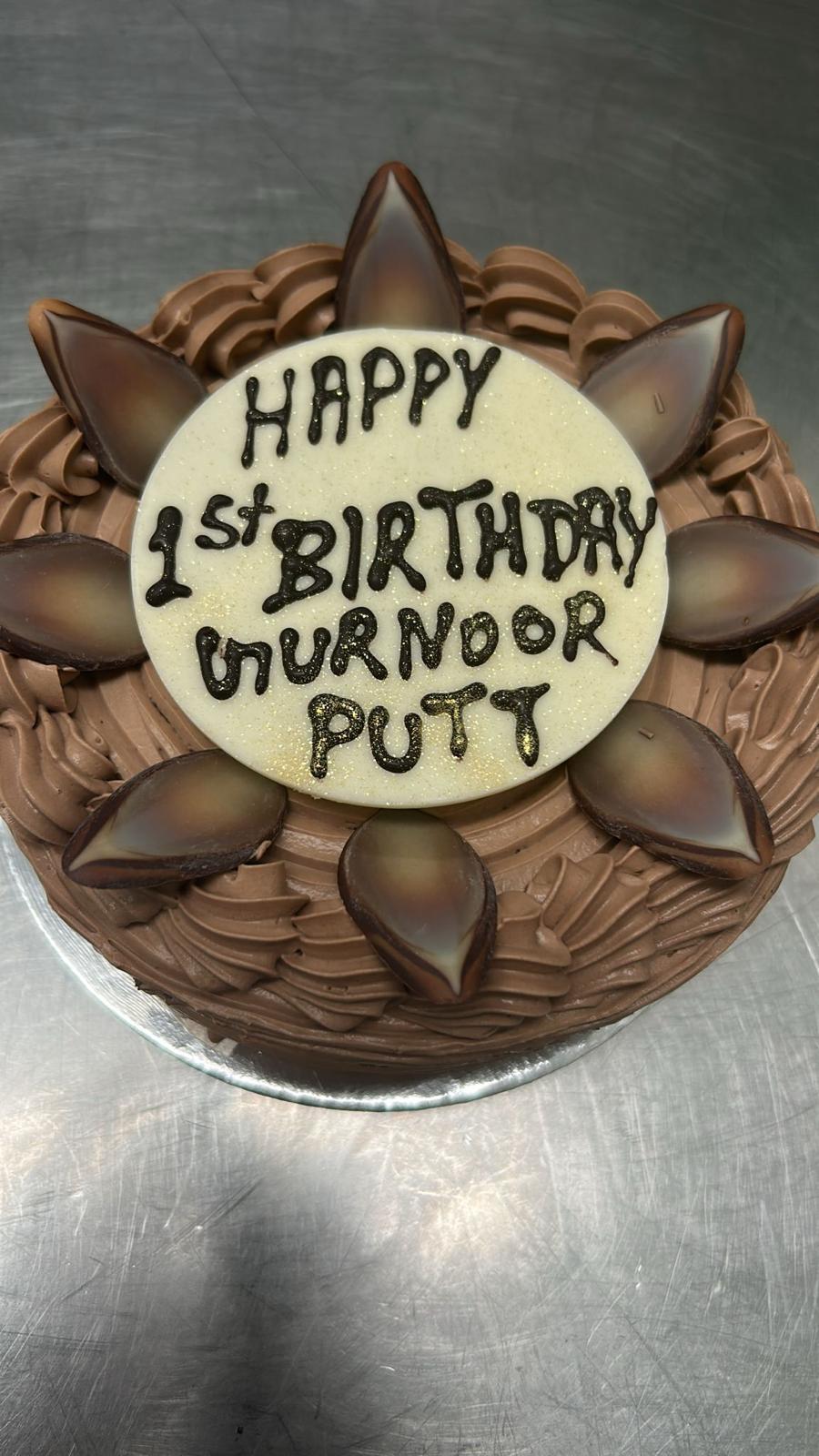 Chocolate birthday cake with piped leaf decoration from Pastryology