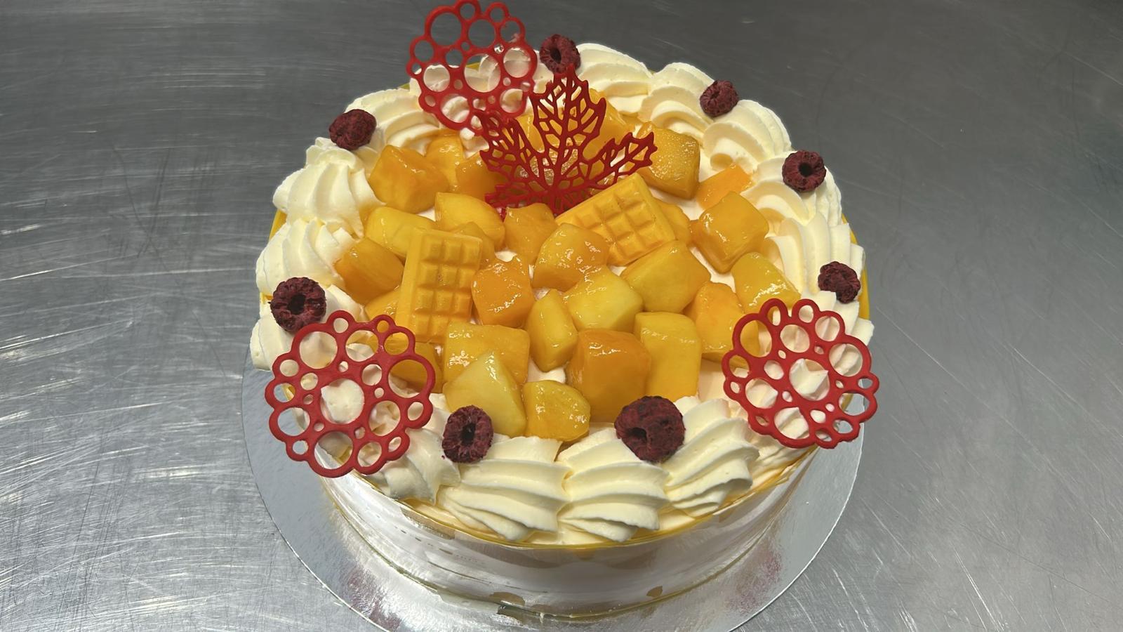 Mango raspberry celebration cake with fresh fruit and cream from Pastryology Wellington